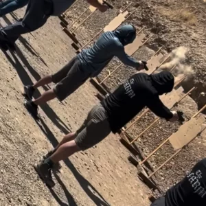 Group of people shooting at cardboard targets